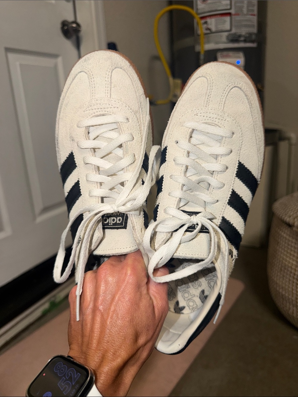 Adidas women’s White Suede Classic with Black Stripes